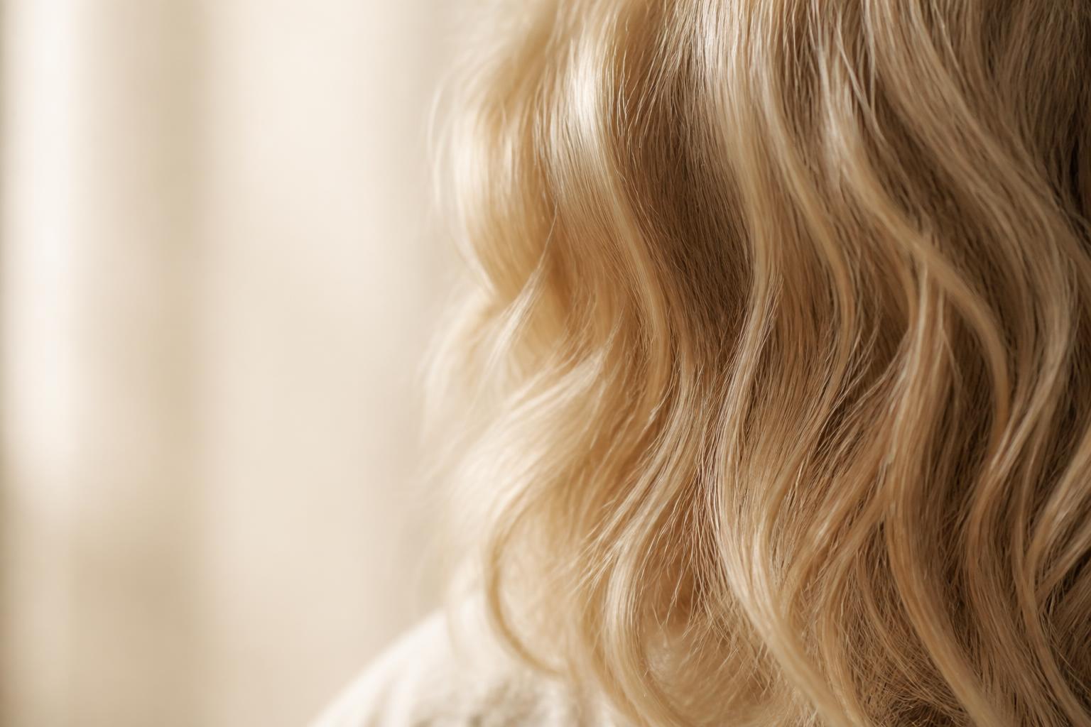 Editorial close study of a young child's coily afro hair and hairline